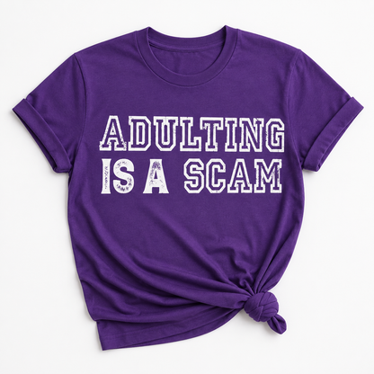 Adulting Is a Scam Tee 💜